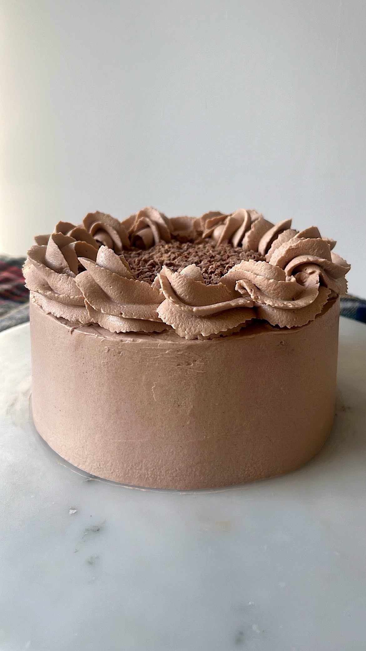 Chocolate cake covered with chocolate cream, perfect for chocolate lovers